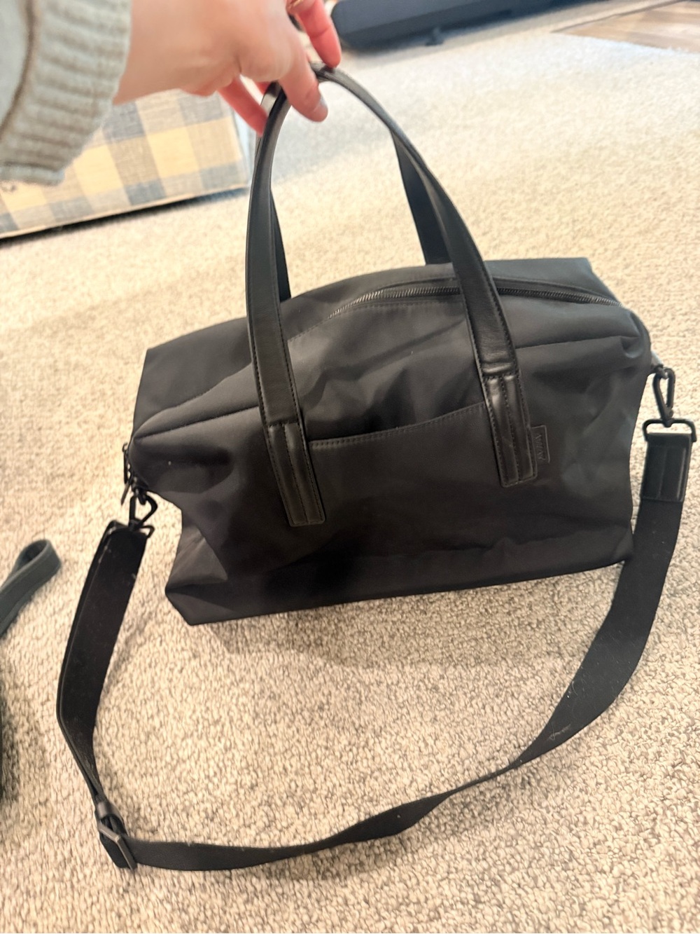 Away black weekender bag